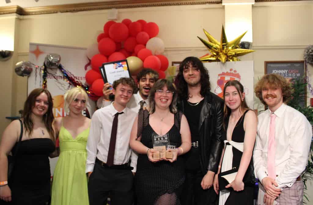 Annalisa with her awards and other crew members: Credit – Lottie Taylor